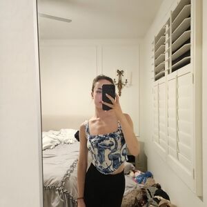 Blue and white tank top.  Xs, joocy babi